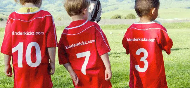 A group of young boys in soccer uniforms.